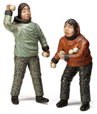 3. Pair of Inuit figures with snowballs. Driftwood and paint. 